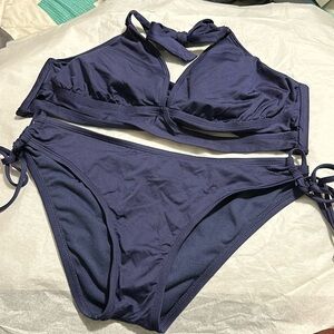 Blue two-piece bathing suit, size medium bottom, and D top